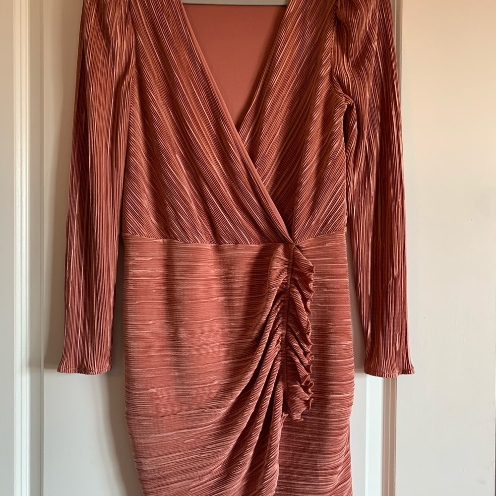 Super cute A-line dress with slit.